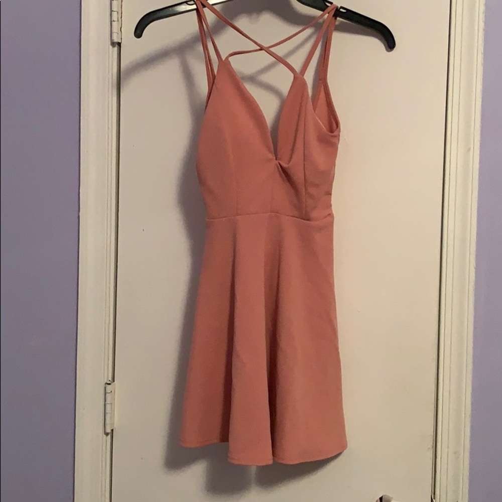 A pink strap dress